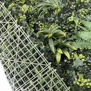 Artificial green wall panel with variegated greens and yellow foliage palms grasses ferns with yellow and white tipped foliage 100×100 cm