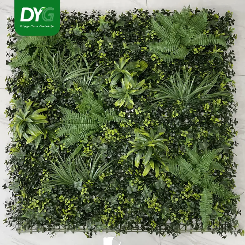 Artificial green wall panel with variegated greens and yellow foliage palms grasses ferns with yellow and white tipped foliage 100×100 cm Featured Image