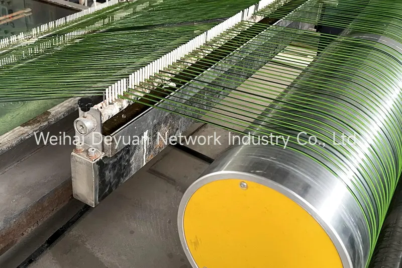 Production process of artificial grass
